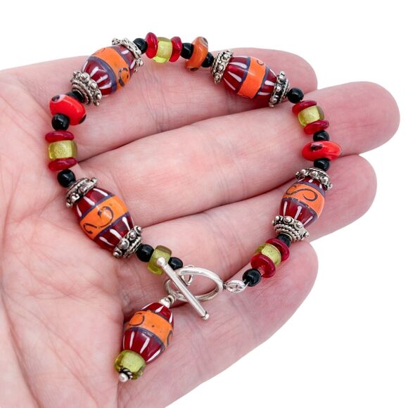 Vibrant Silver Tone Orange Red Yellow Black Glass Bead Bracelet 7.5" - Picture 1 of 6